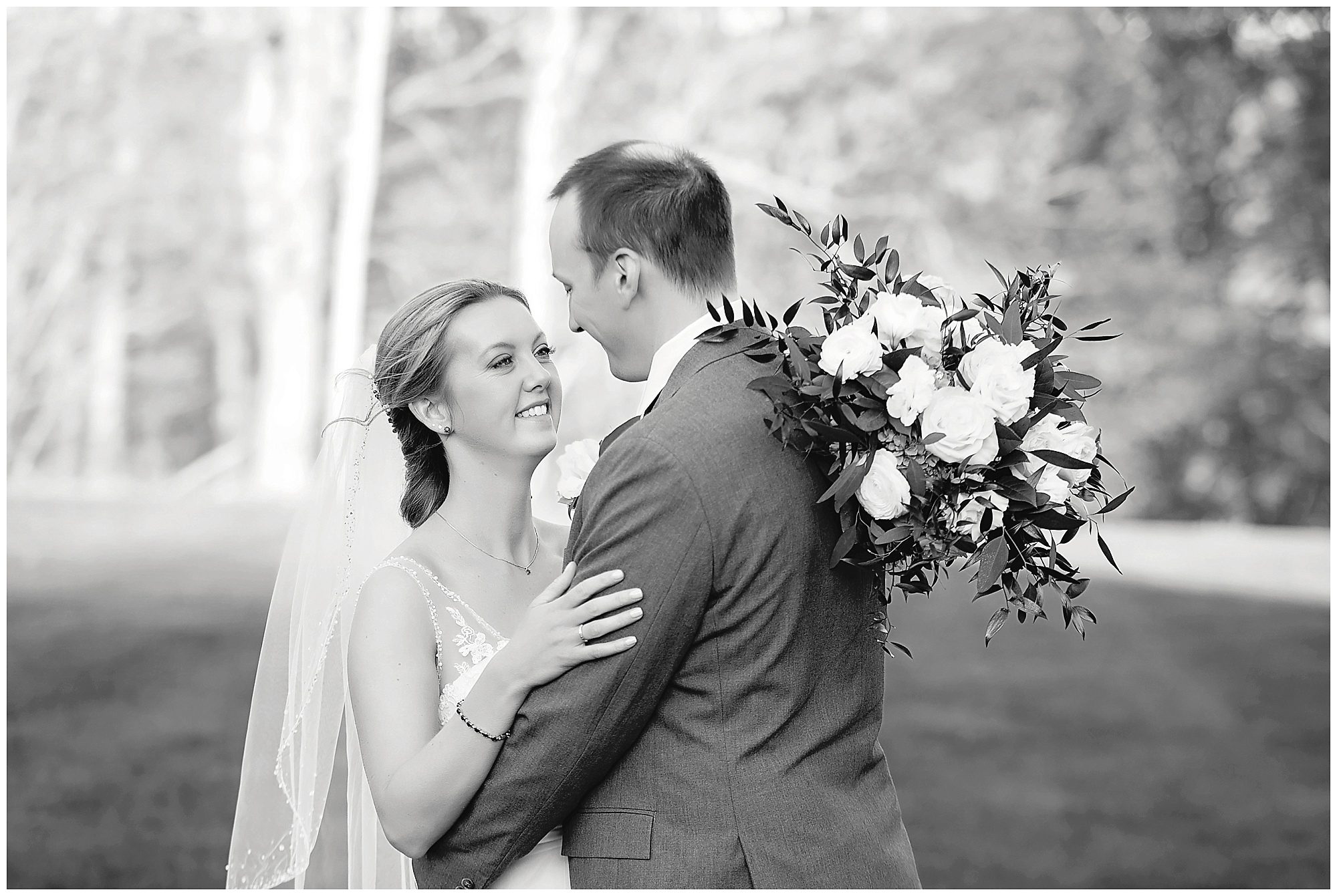 black and white image of couple looking at each other