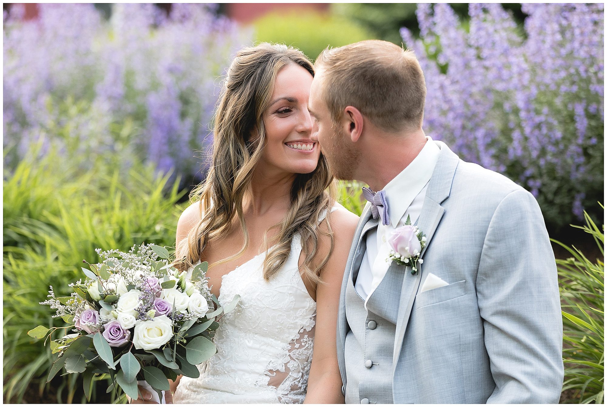 bride and groom purple flowers