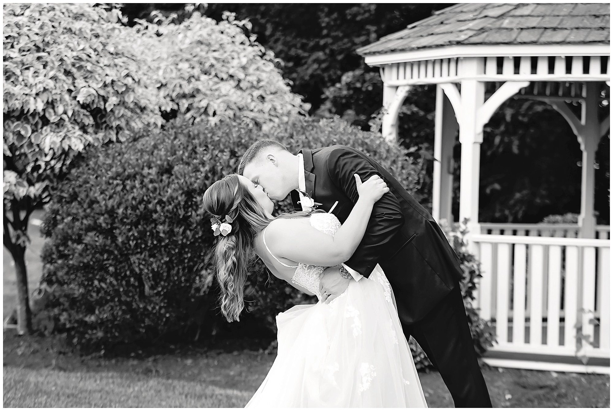 maneeley's wedding bride and groom kissing
