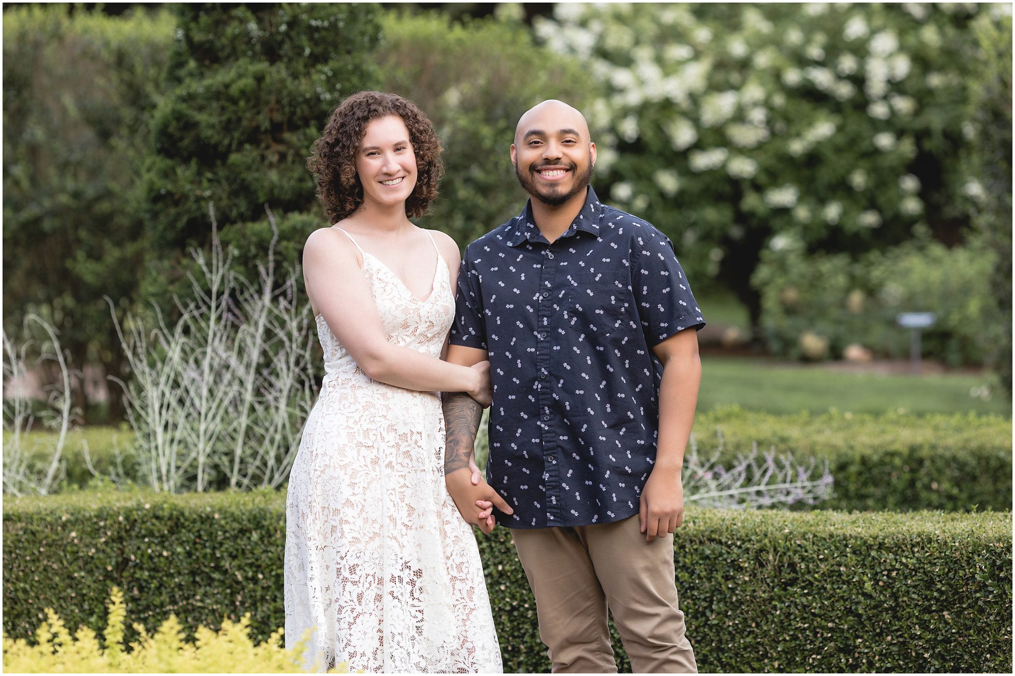 engaged couple in a garden