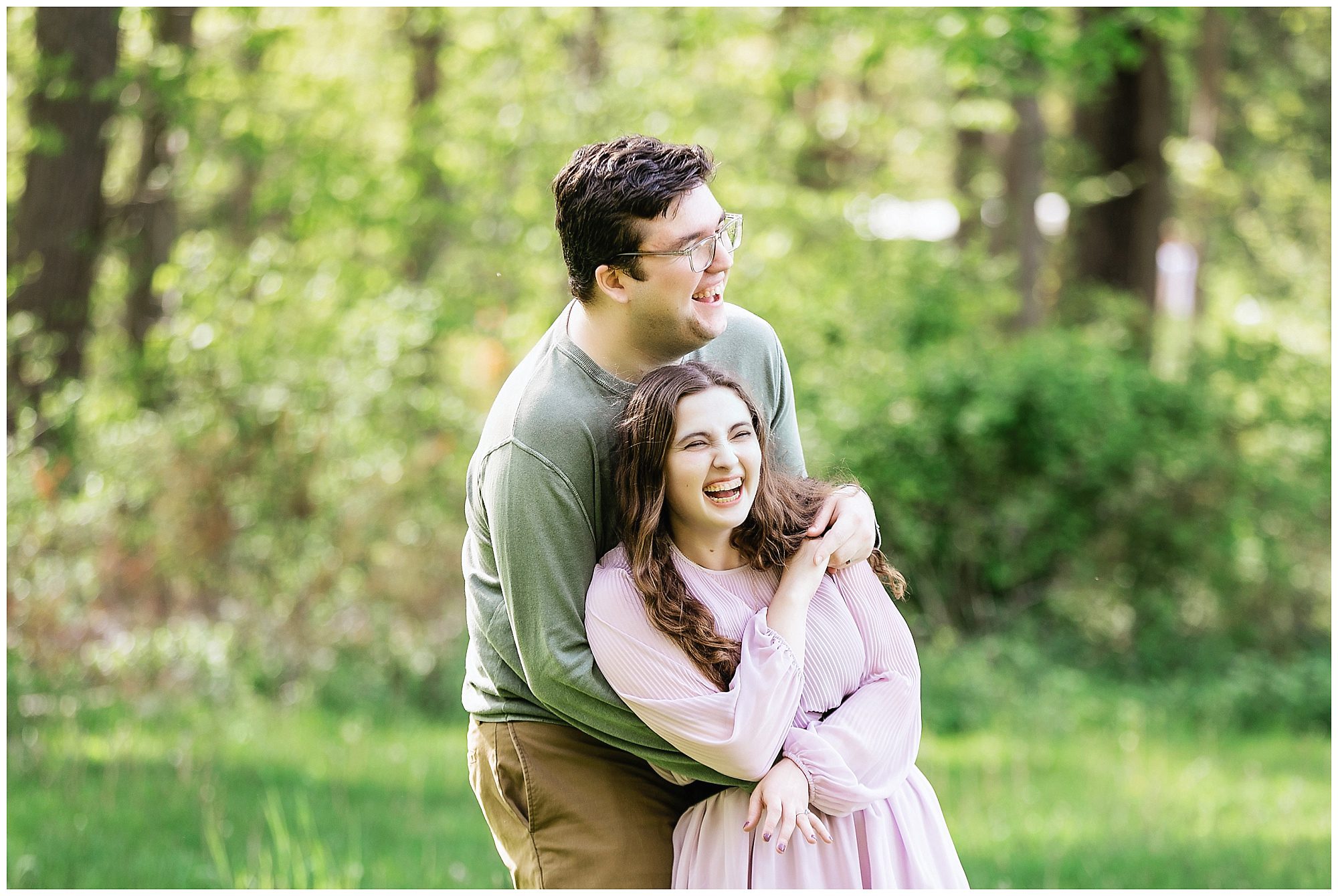 engaged couple laughing