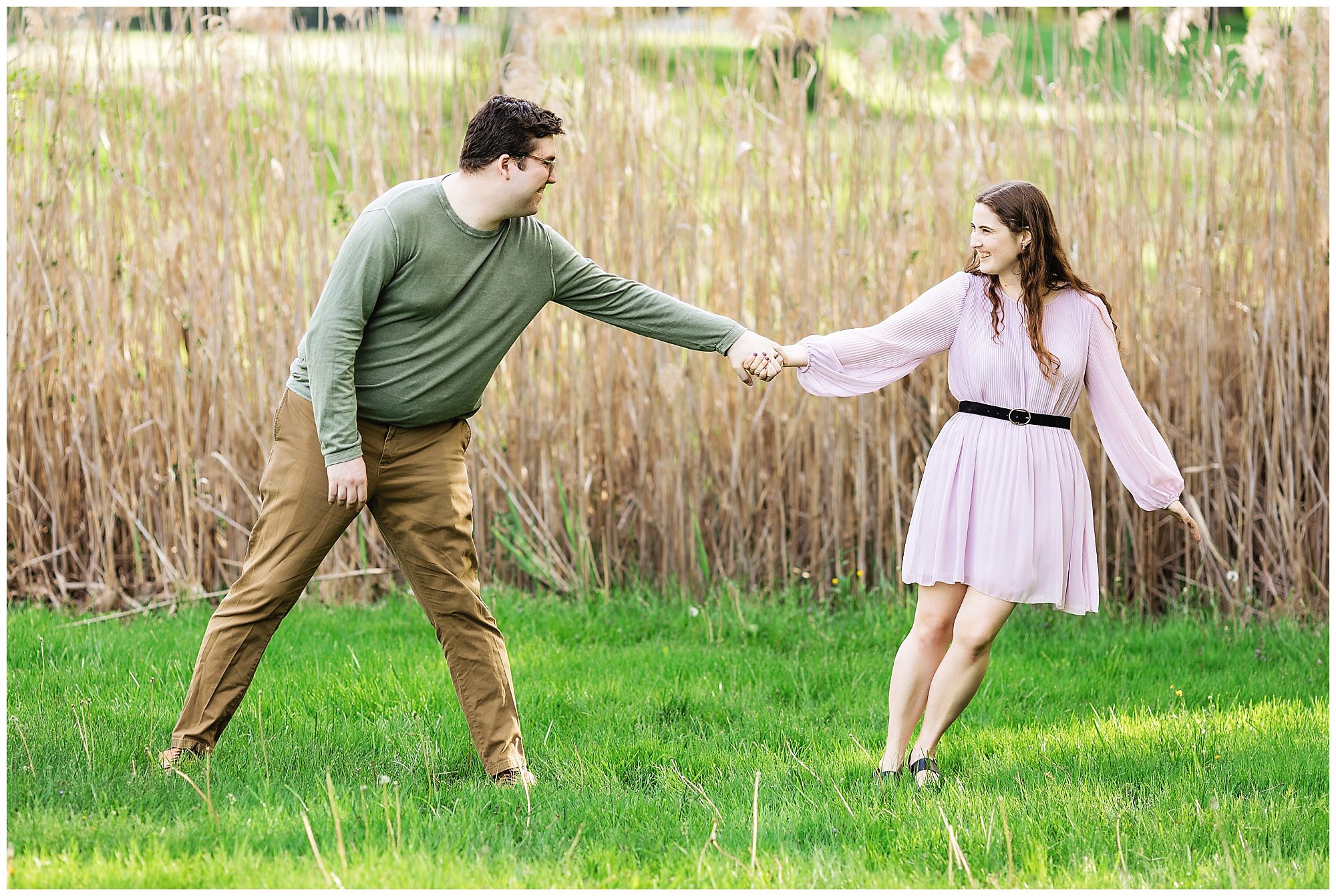 couple by tall grass