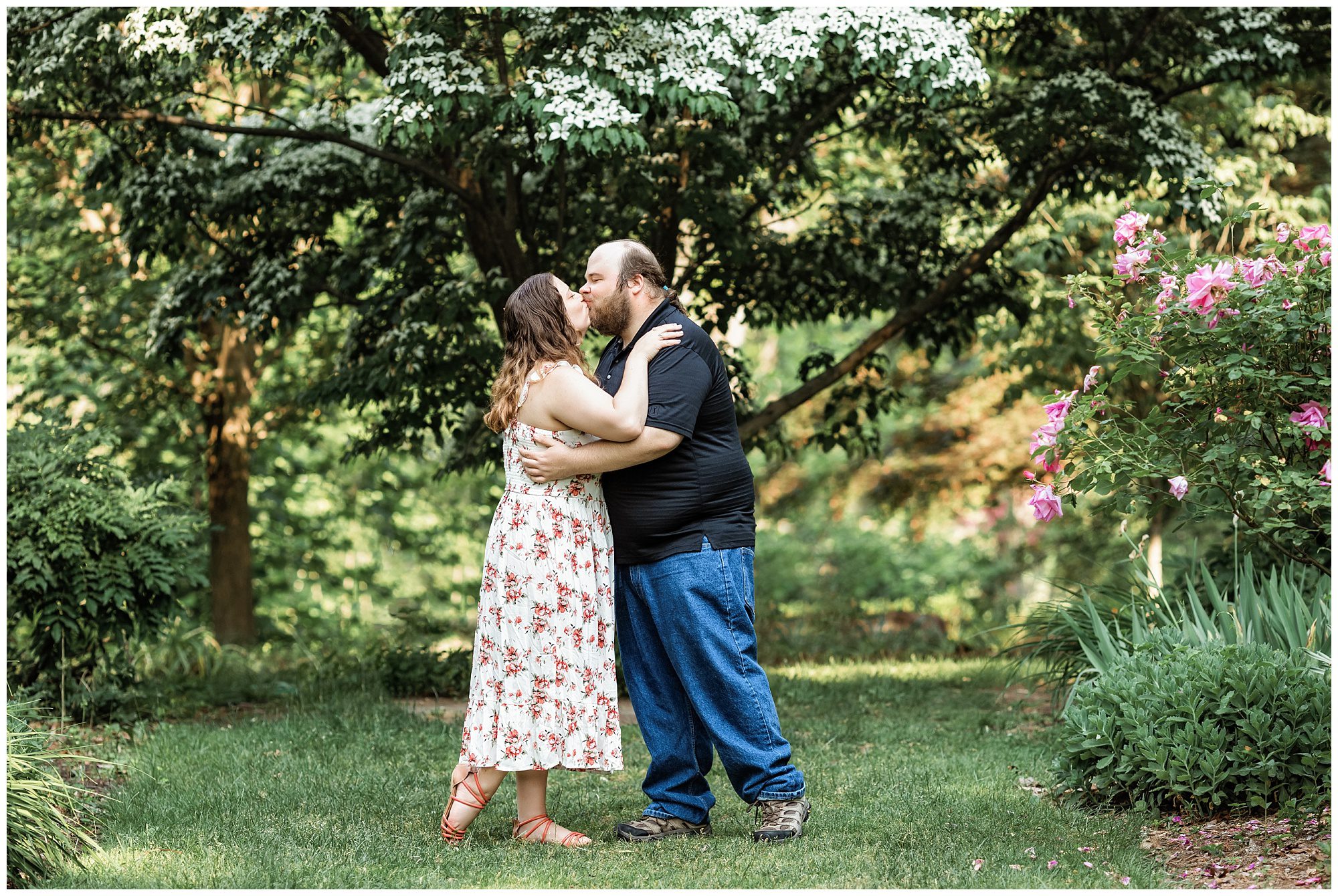 engaged couple kissing