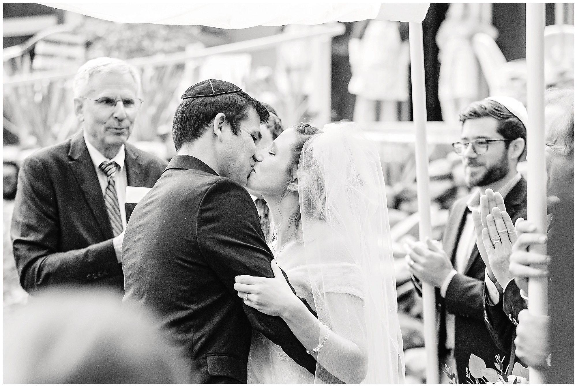 bride and groom's first kiss