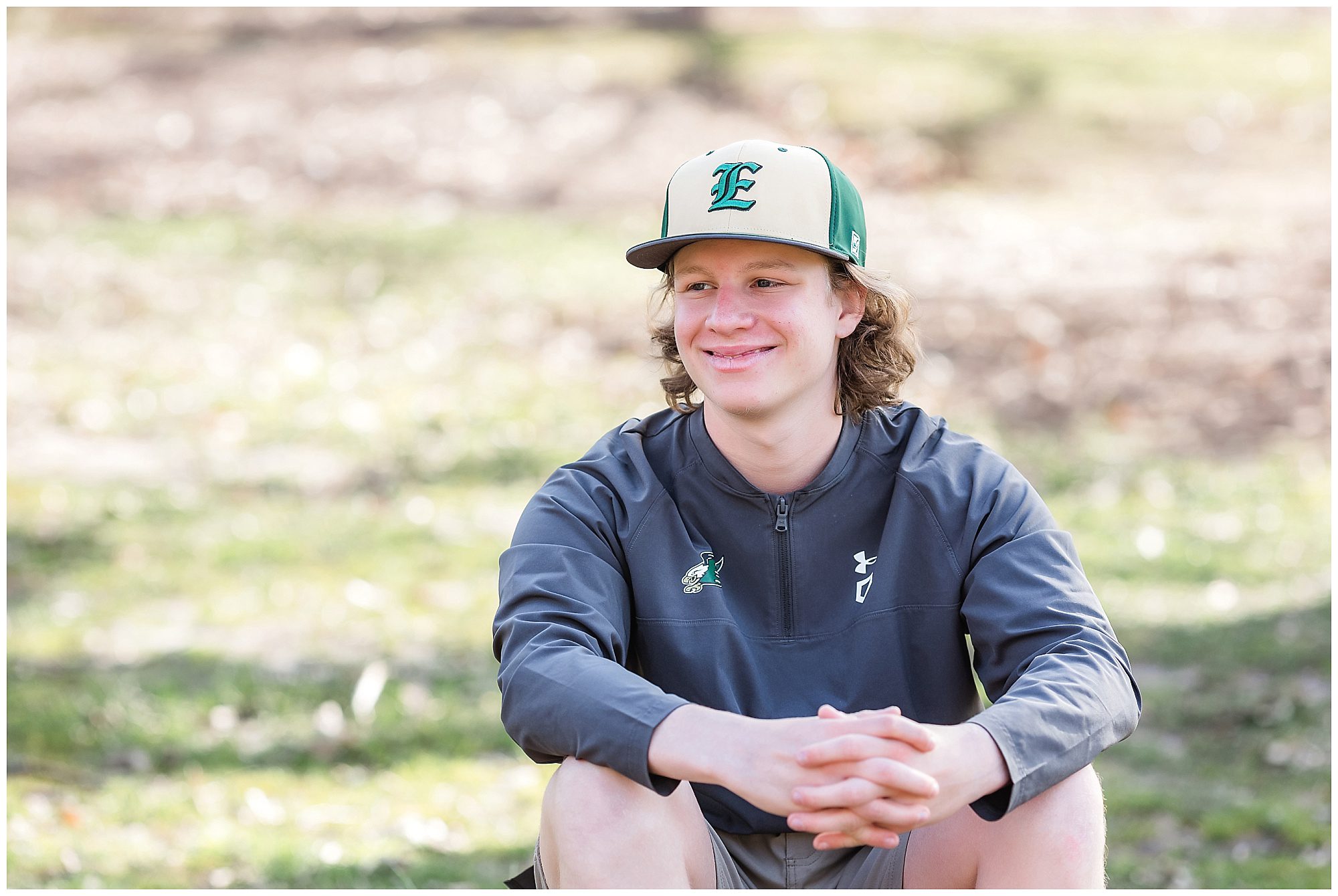 Senior boy Enfield CT smiling wearing a baseball cap