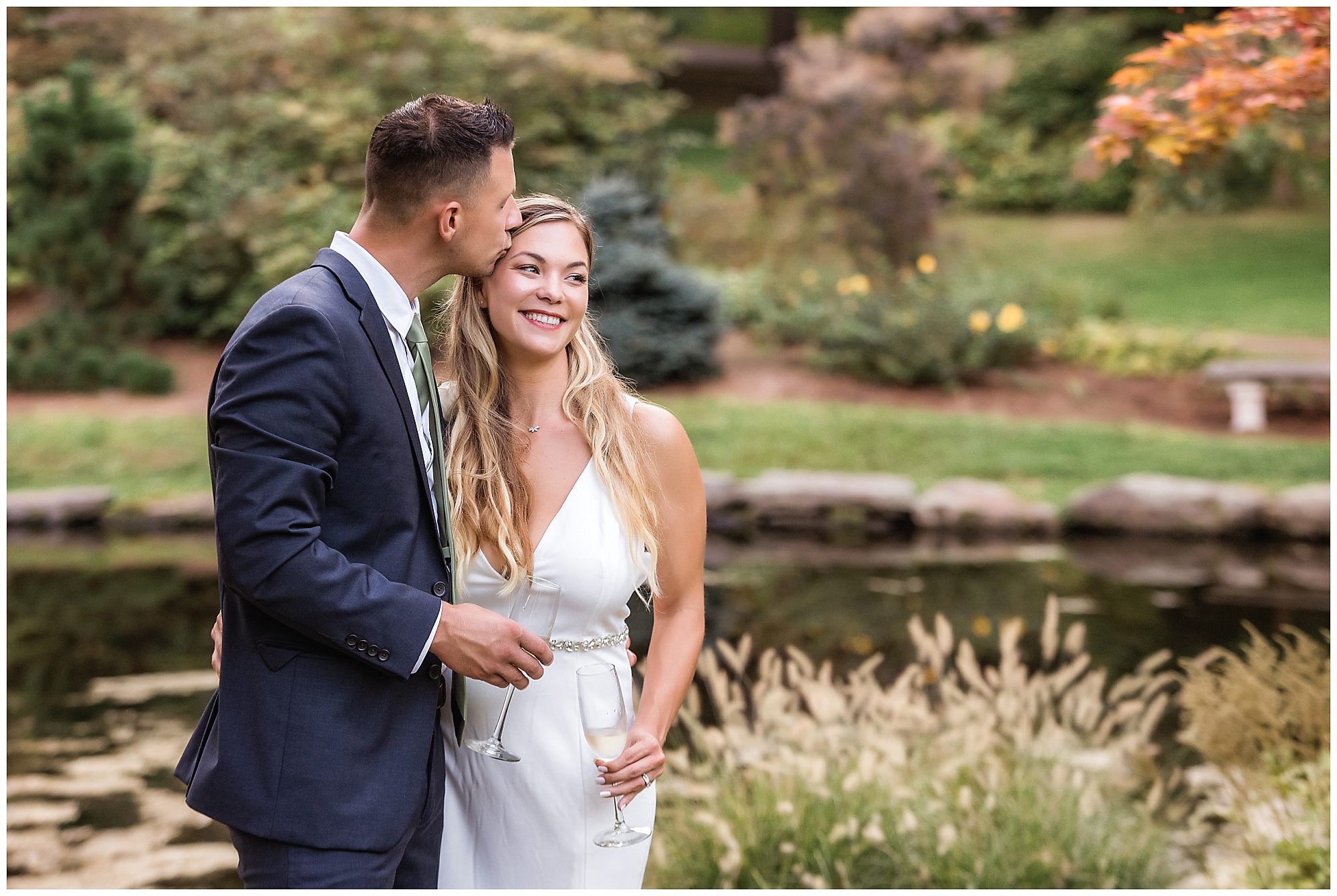bride and groom with champagne