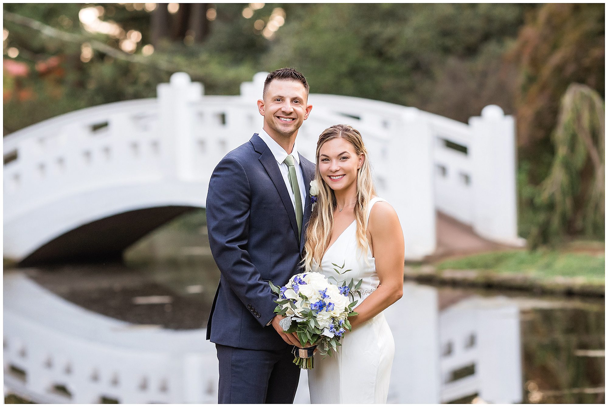 wedding portrait by bridge