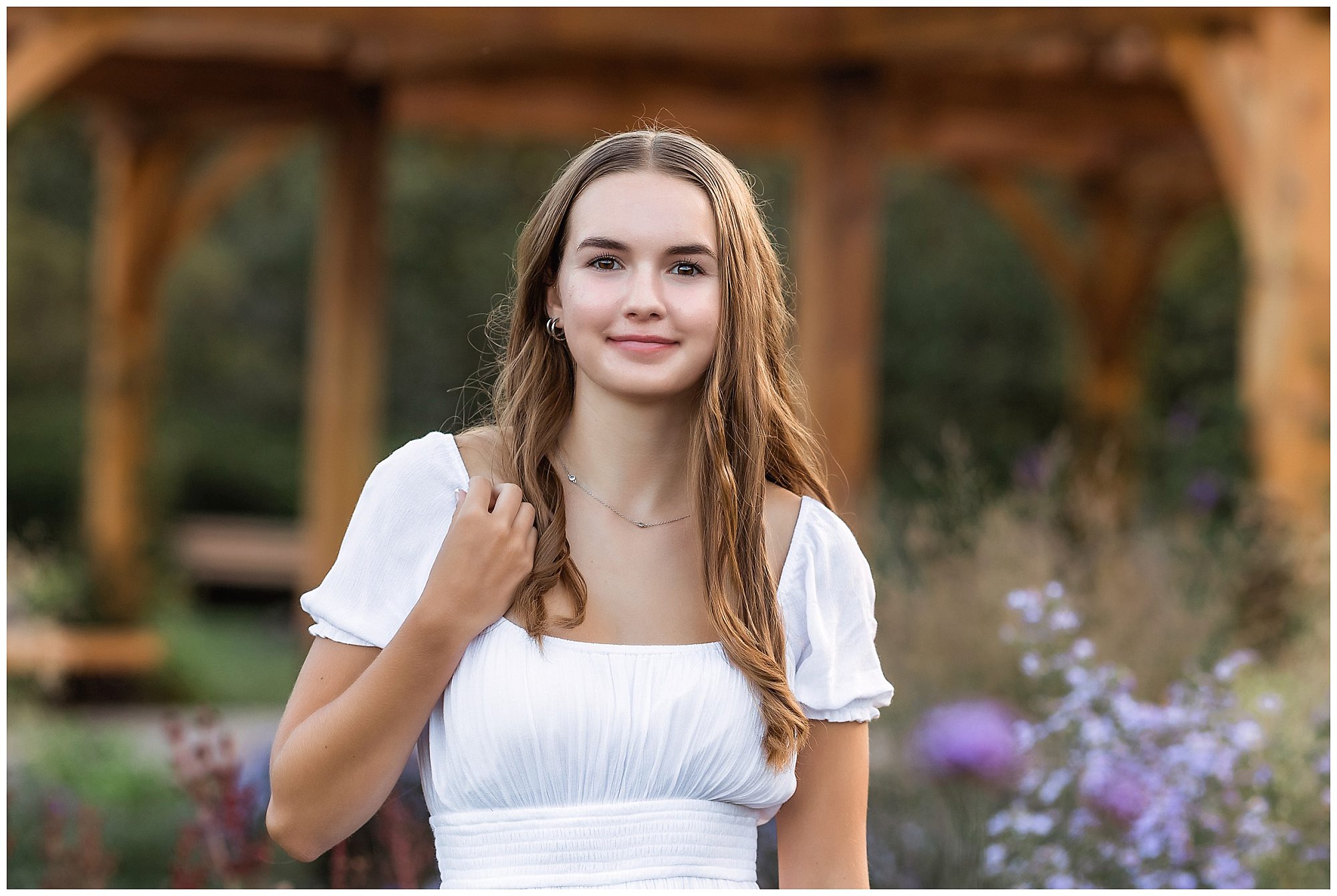 senior in front of a gazebo
