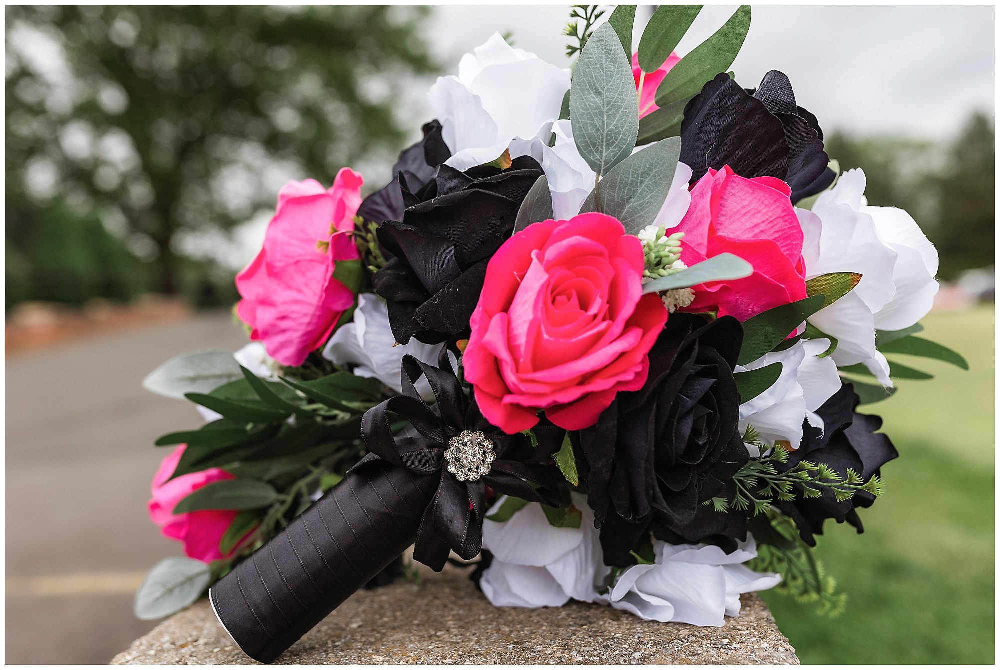 pink white and black bridal bouquet
