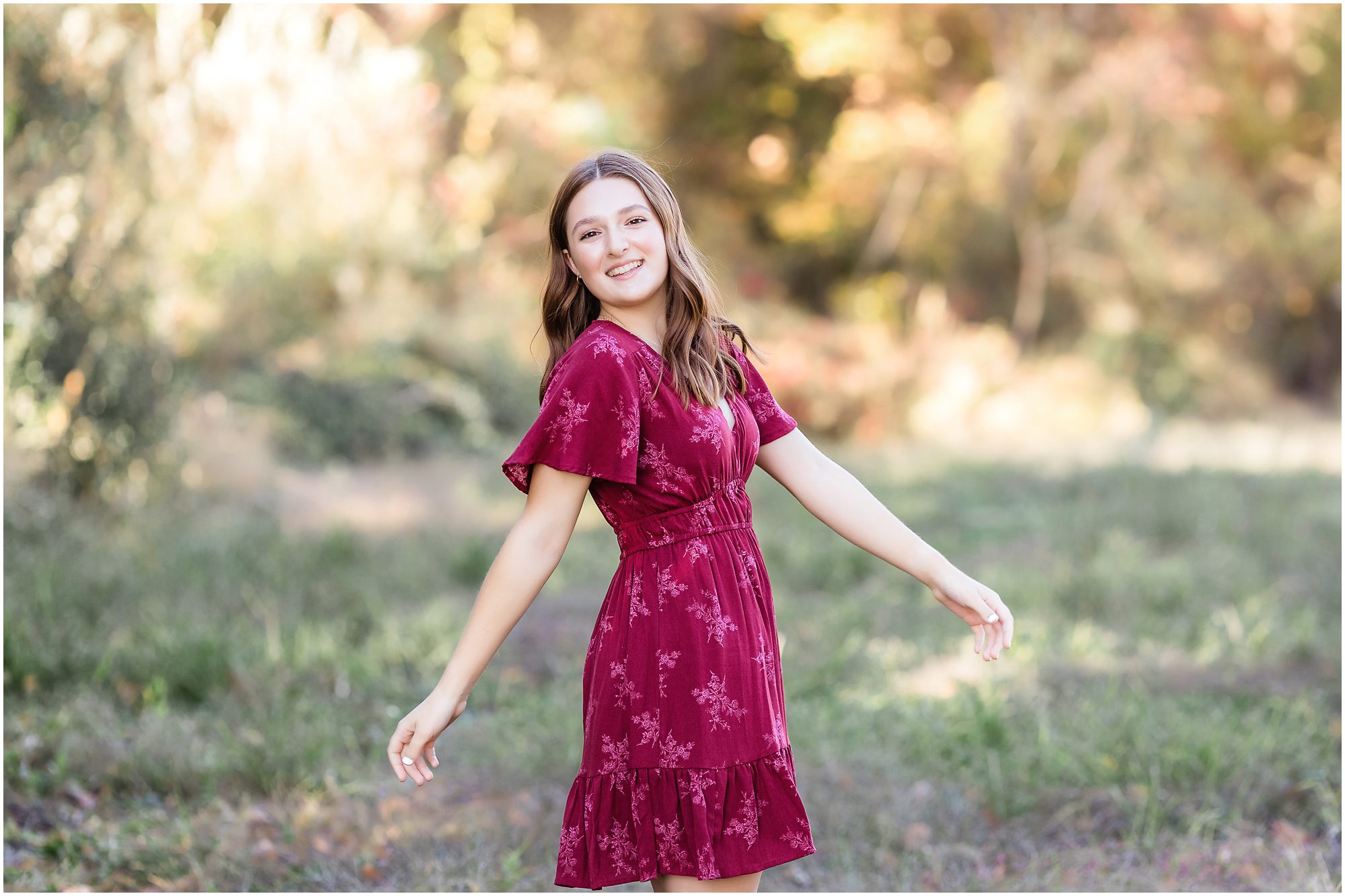 High school girl senior session in a field