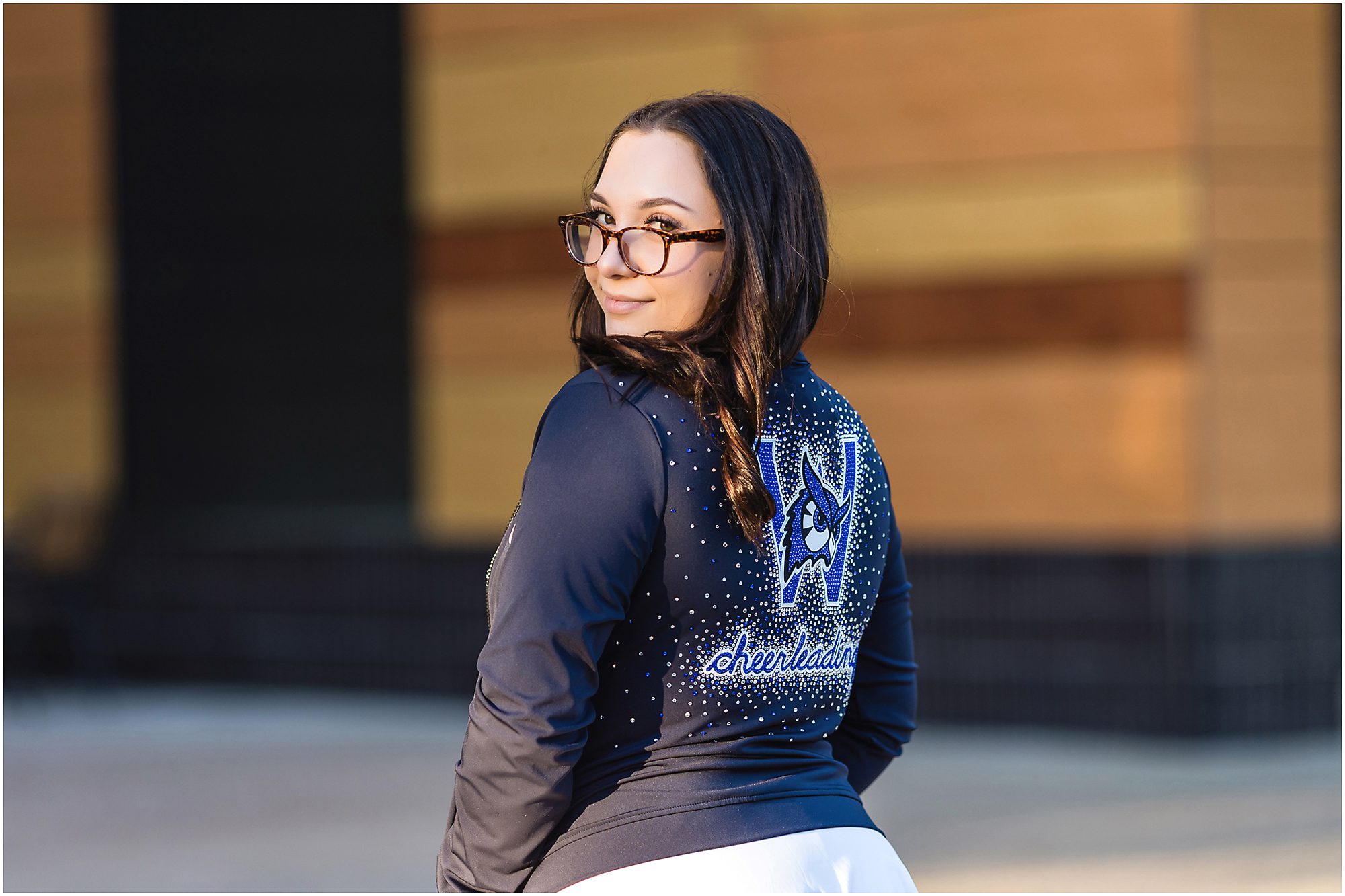 college graduate cheerleader senior session
