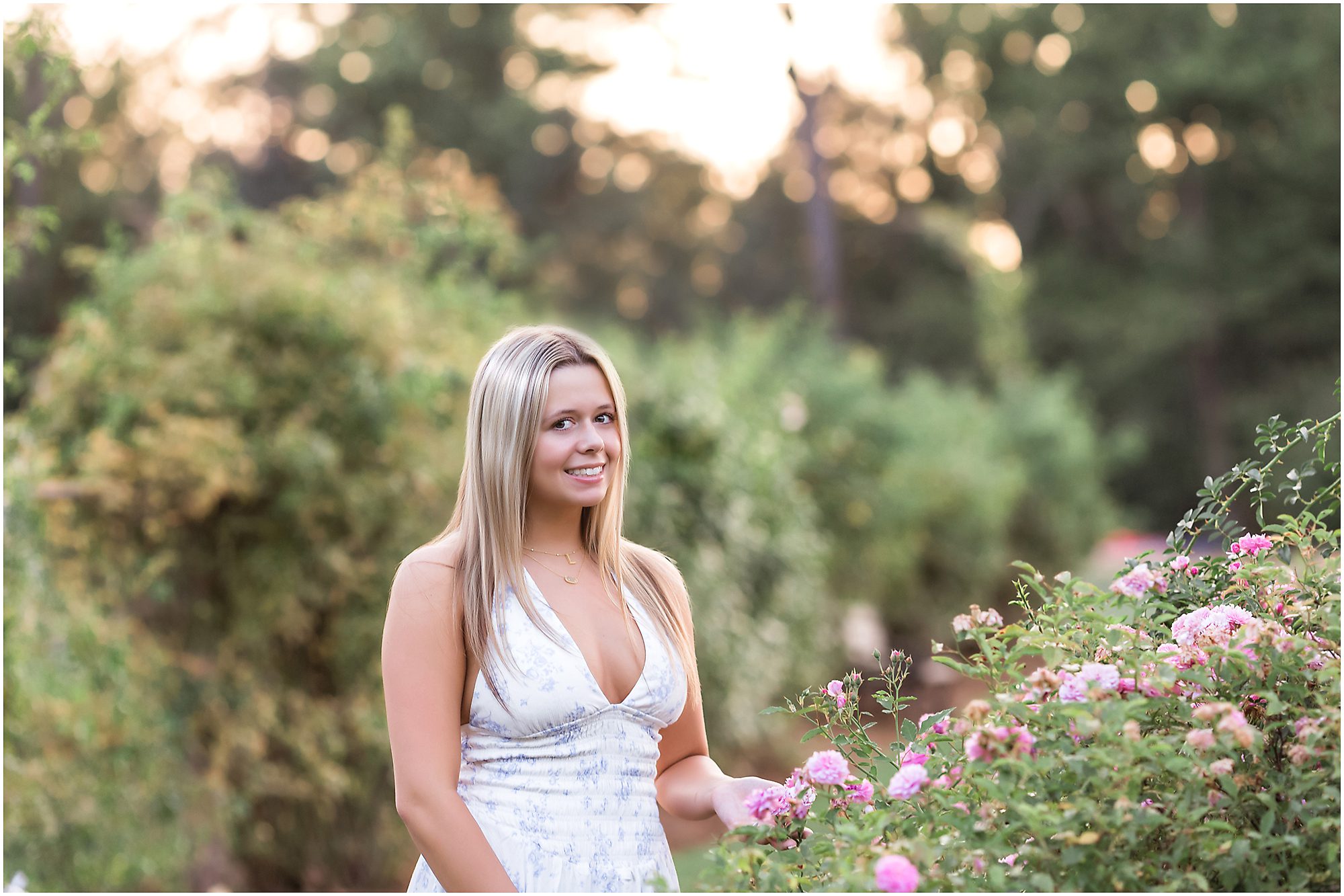 High school girl senior session in a garden