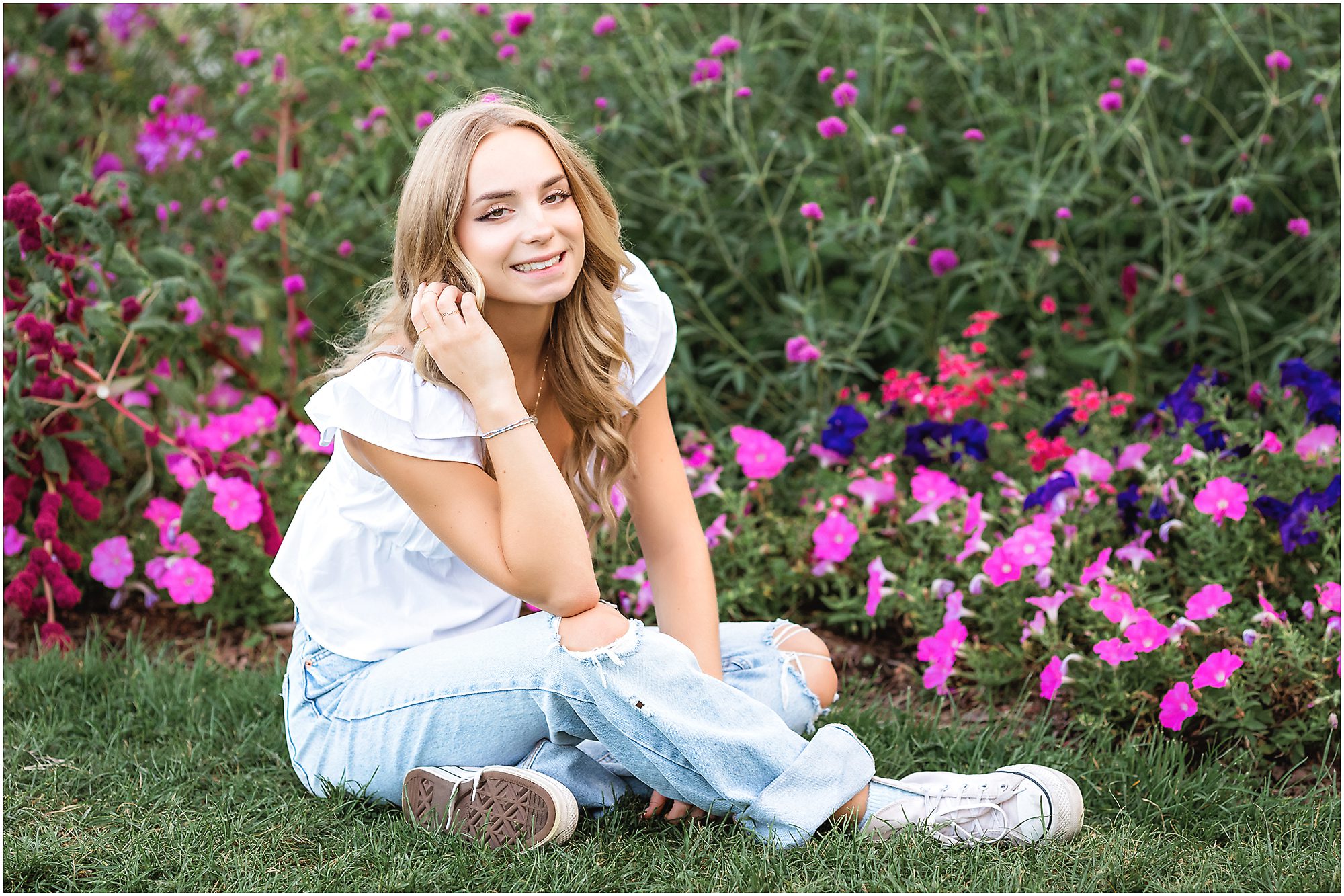 senior girl in a flower garden