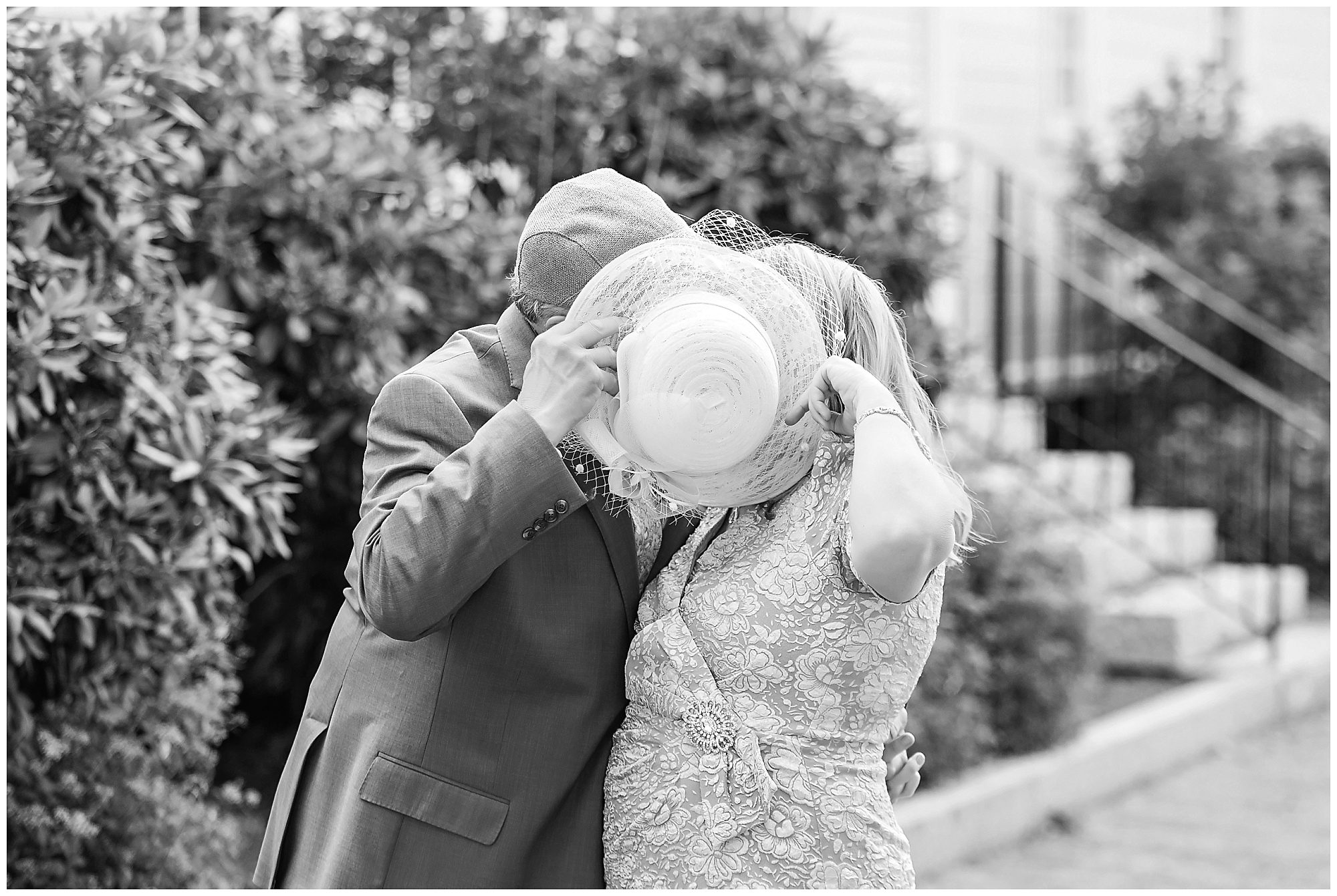 Intimate Wedding Meeting House steps Storrowton Tavern Portraits old colonial couple kissing behind a hat