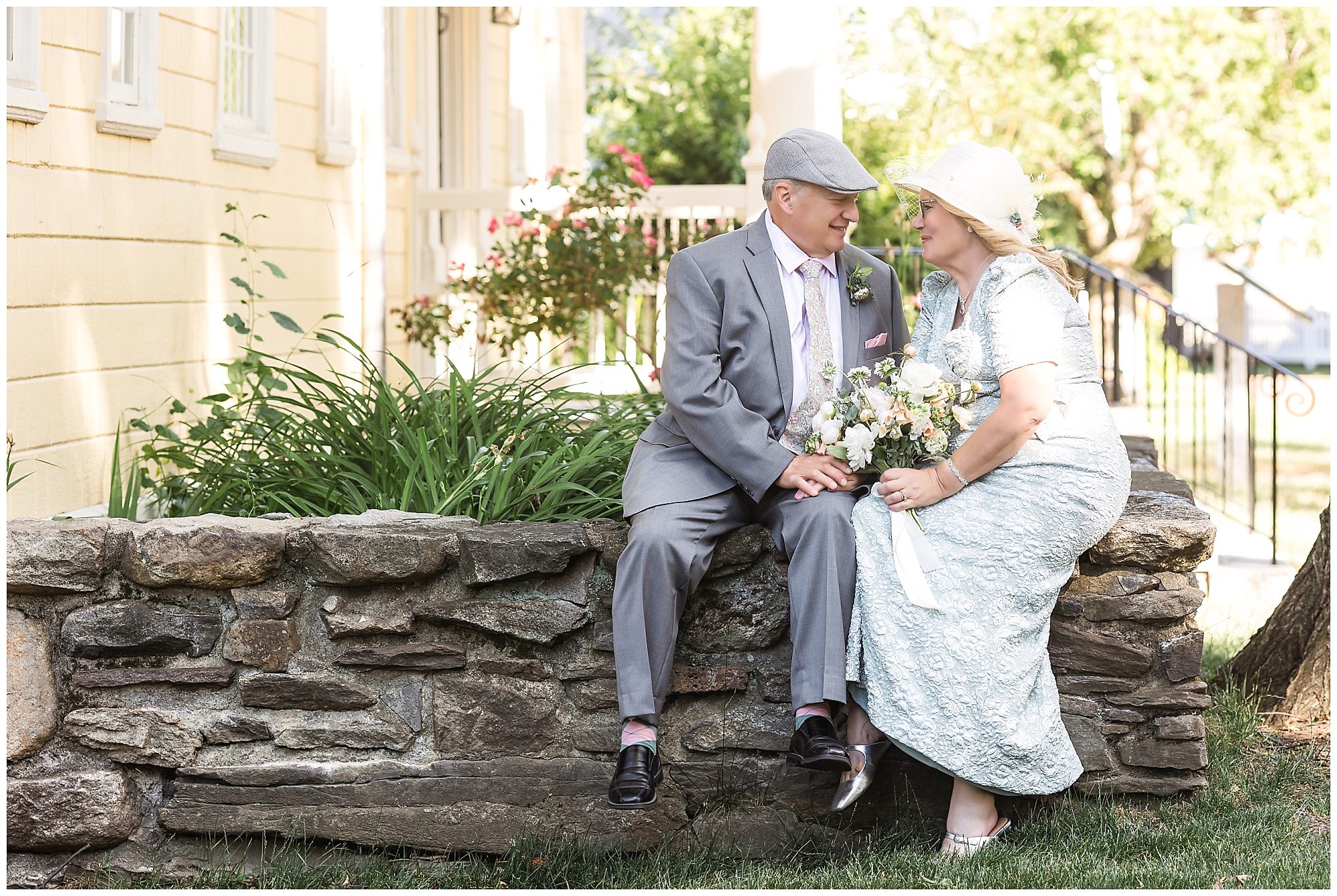 Intimate Wedding Meeting House steps Storrowton Tavern Portraits old colonial couple sitting on a stone wall