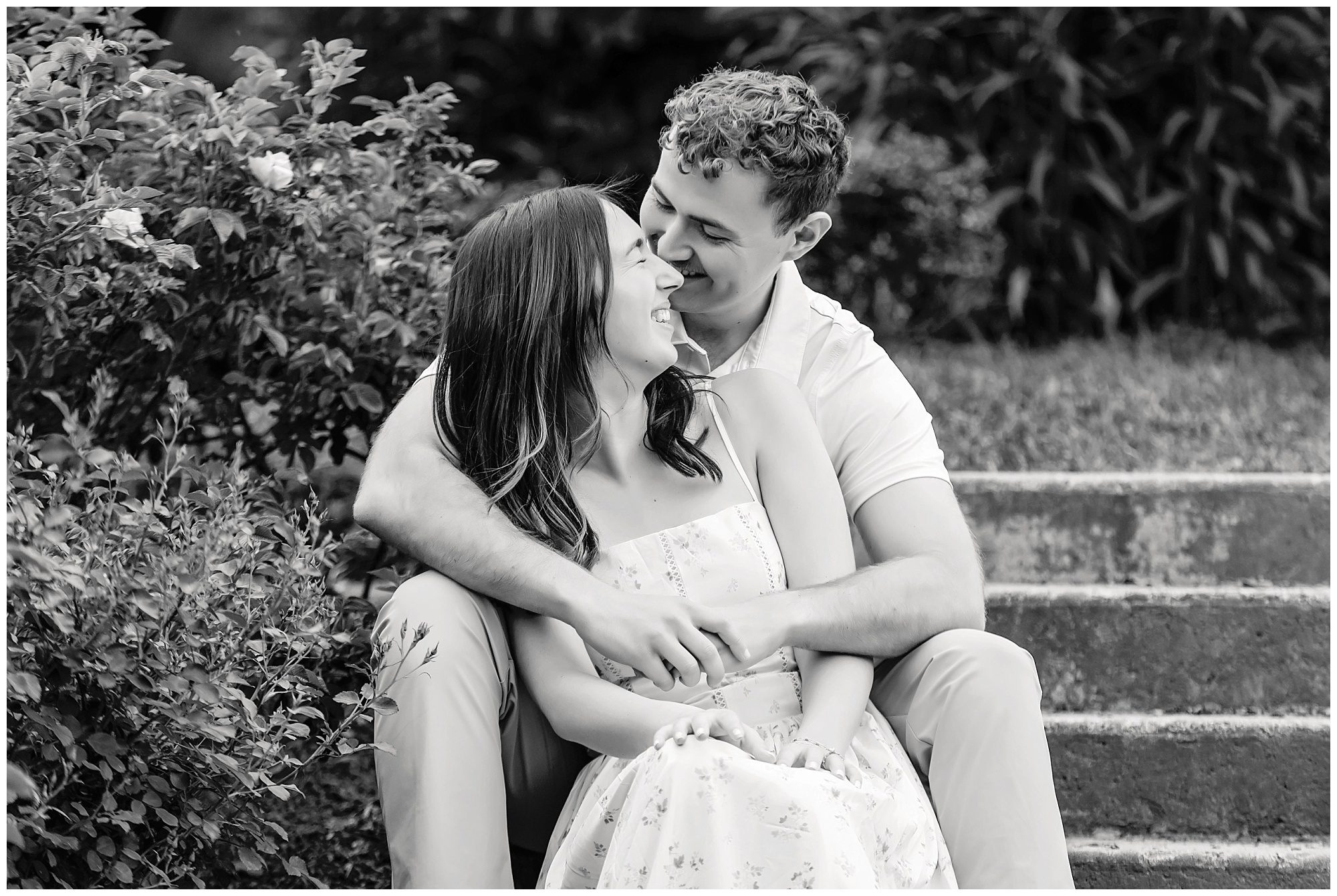 Couple laughing during engagement session in Hartford