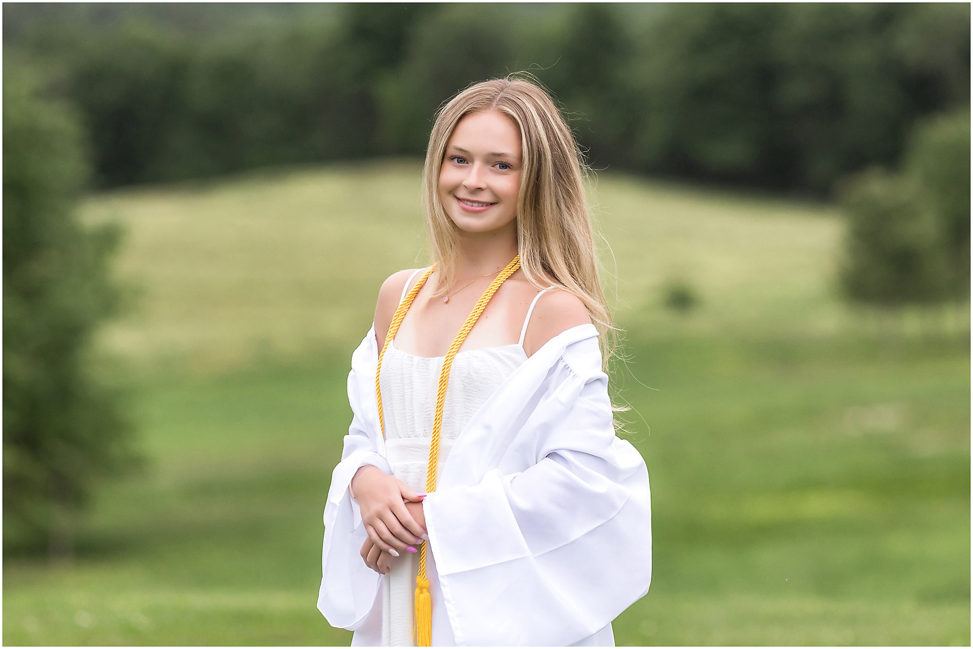 cap and gown senior girl