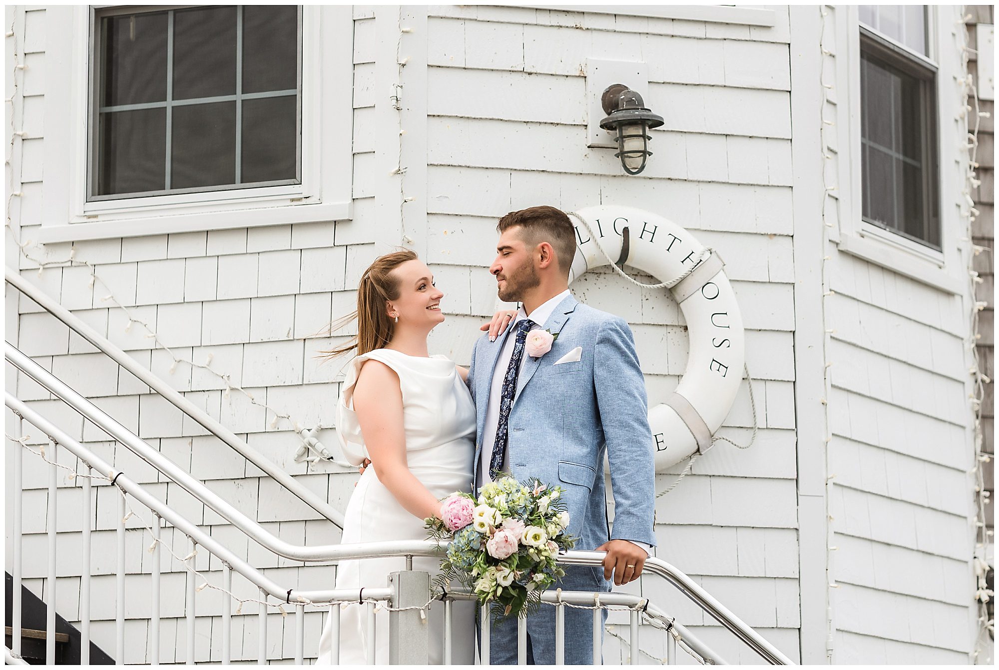 Bride and groom portraits at Saybrook Point marina